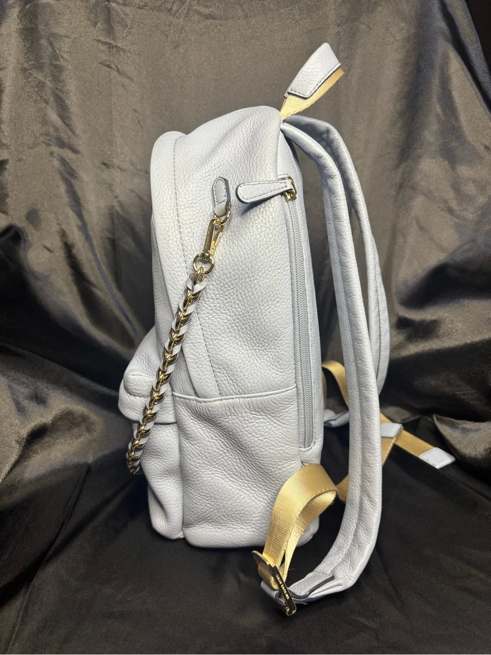 Michael Kors Slater Medium Pebbled Leather Backpack in a pale blue with dust bag